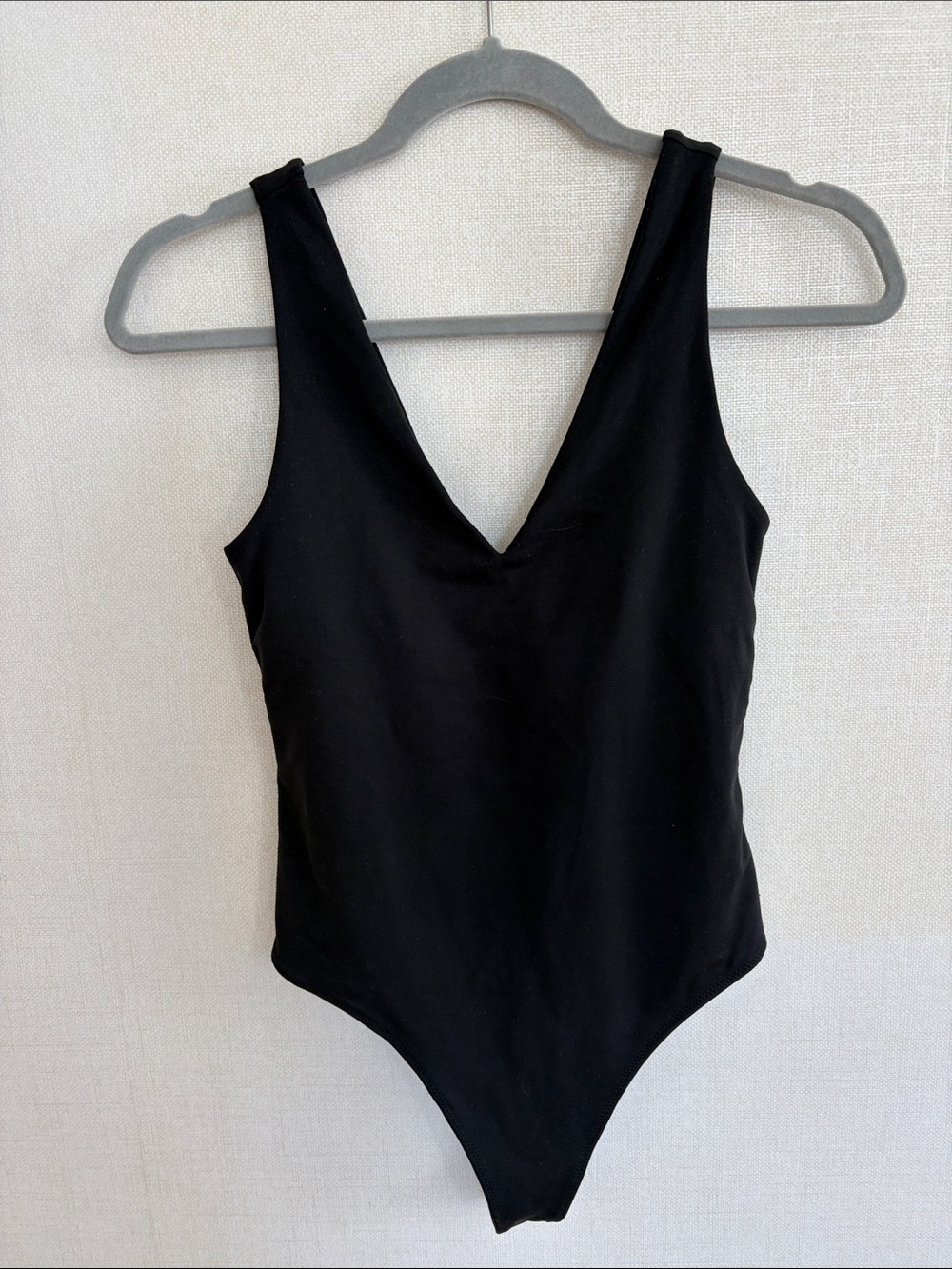 Vuori Black V-Neck Bodysuit